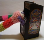 Amigurumi Crochet NobyNoby Boy likes Galaga.  Go NAMCO!