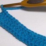 Cape step 4 - Slip stitches shown in back loop, seen from the "wrong side"